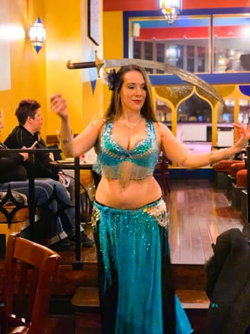 Join Us Every Friday & Saturday Night At 7pm For A Live Music & Belly Dancing Performance While You Enjoy Our Incredible Mediterranean Cuisine! Join Us Every Friday & Saturday Night At 7pm For A Live Music & Belly Dancing Performance While You Enjoy Our Incredible Mediterranean Cuisine!