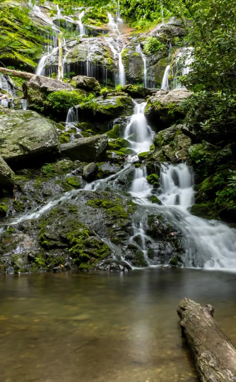 Catawba Falls Trail The cascade of Catawba Falls flows into a pond in Asheville