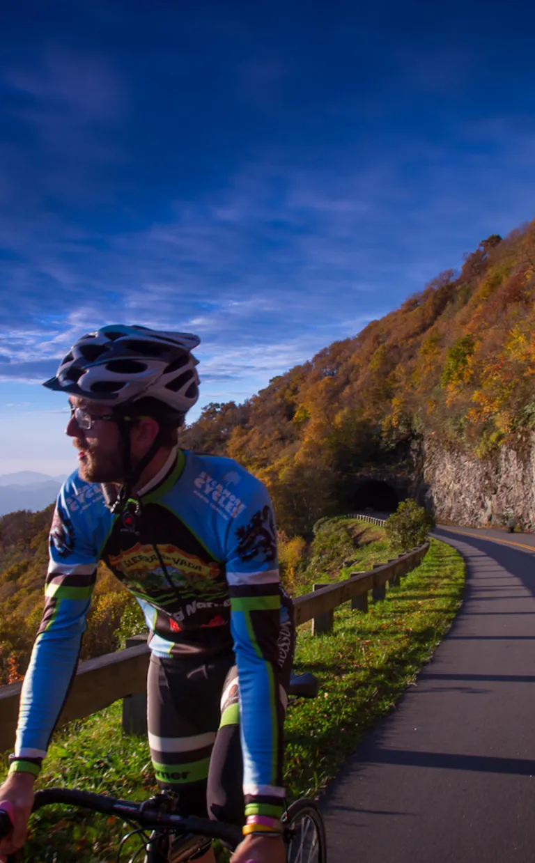 How To: Road Biking Adventures in Asheville Two cyclists ride the Blue Ridge Parkway in Asheville