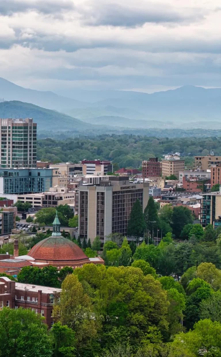 About Explore Asheville Downtown Asheville by Reggie Tidwell